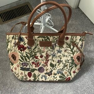 Floral beautiful handbag by Signare slightly used but in new condition